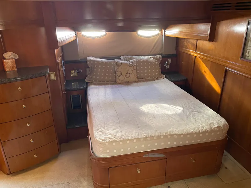 Slide: The Image of Luxurious bedroom interior of 2000 Carver 530 Voyager Pilothouse yacht. - 22