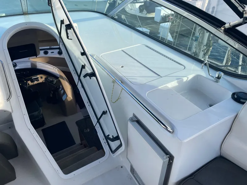 Slide: The Image of Interior view of 2000 Carver 530 Voyager Pilothouse yacht, featuring stairs and cockpit area. - 49