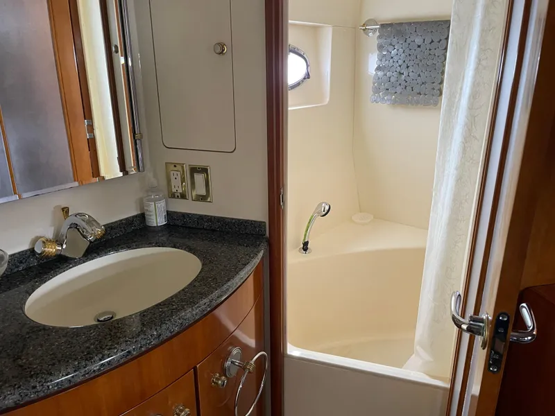 Slide: The Image of Bathroom interior of 2000 Carver 530 Voyager Pilothouse with sink and shower. - 29
