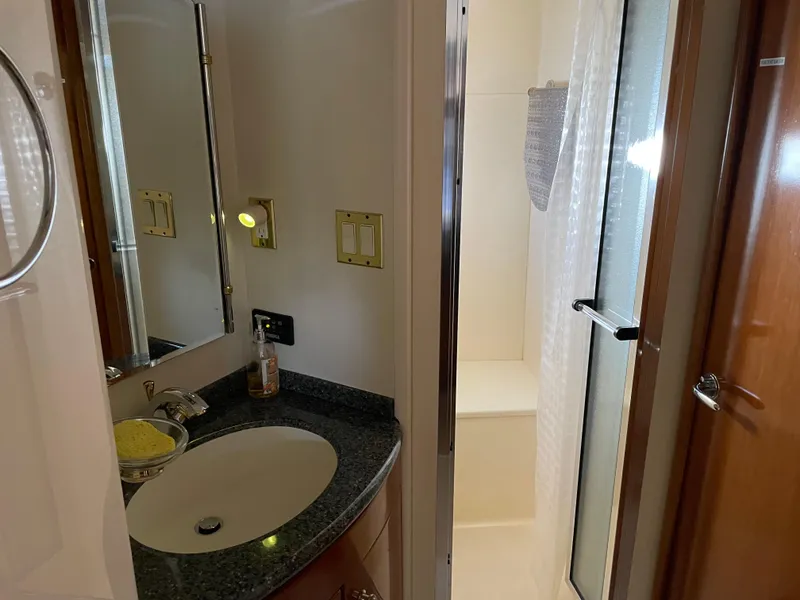 Slide: The Image of Bathroom interior of 2000 Carver 530 Voyager Pilothouse with sink and shower. - 39