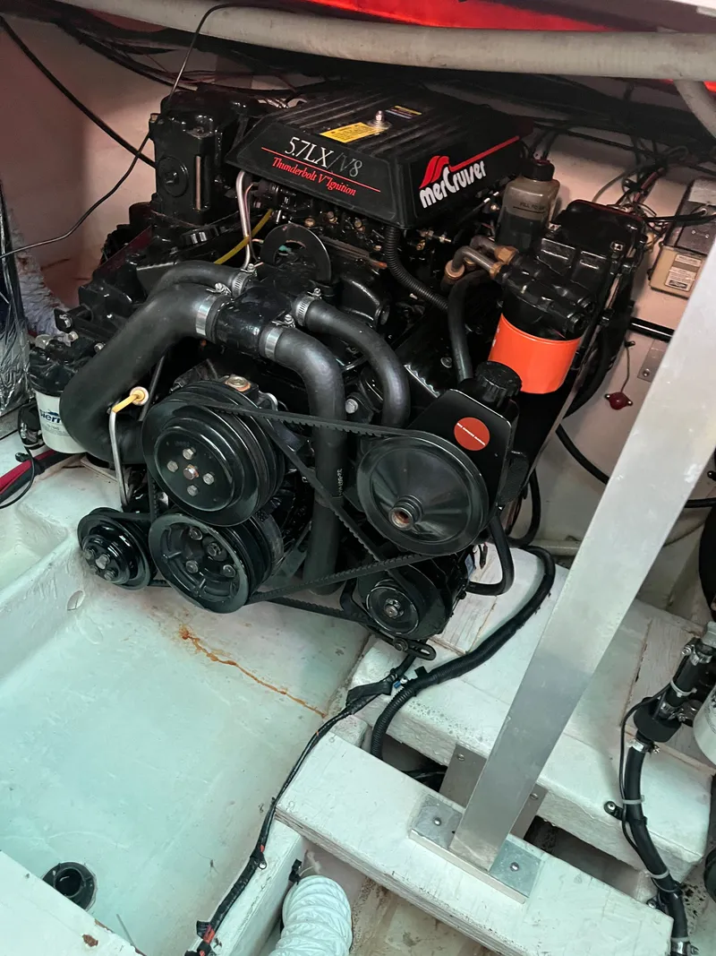 Slide: The Image of Engine compartment of a 1996 Cruisers Yachts 3375 with MerCruiser 5.7LX V8 engine. - 15