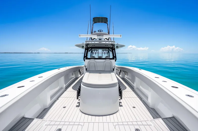 Slide: The Image of 2024 Freeman 42 boat on calm blue ocean under clear sky. - 33