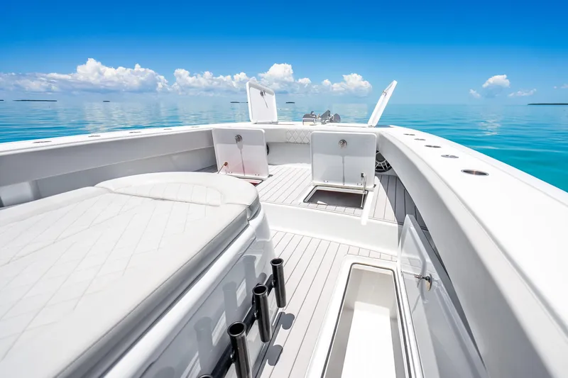 Slide: The Image of 2024 Freeman 42 boat interior with open hatches, sleek design, and ocean view. - 37