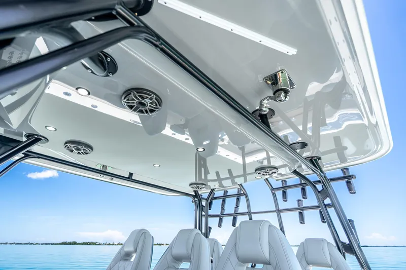 Slide: The Image of 2024 Freeman 42 boat interior with sleek design and modern features, overlooking serene blue waters. - 45