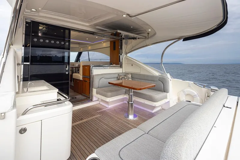 Slide: The Image of Luxurious 2018 Riviera 4800 Sport Yacht with elegant interior and ocean view. - 23