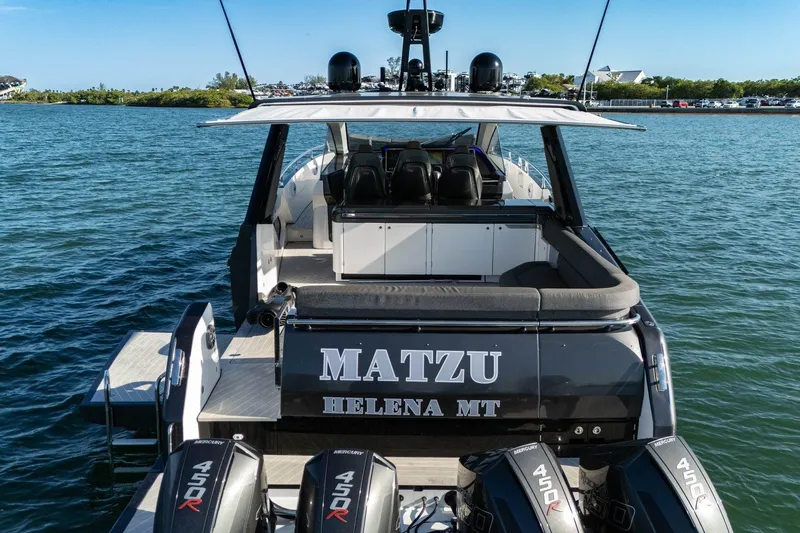 Slide: The Image of 2023 Azimut Verve 47 luxury yacht with powerful Mercury 450R engines on open water. - 16