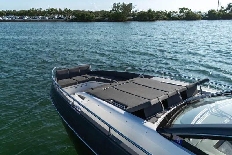 Slide: The Image of 2023 Azimut Verve 47 yacht with spacious deck, cruising on calm waters. - 19