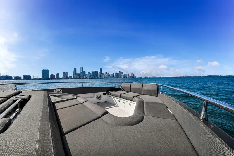 Slide: The Image of 2023 Azimut Verve 47 yacht with city skyline and ocean view. - 23