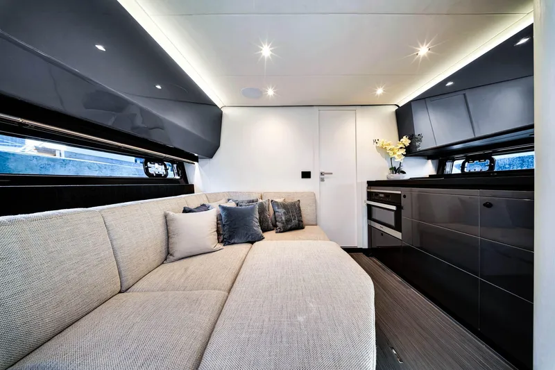 Slide: The Image of Luxurious interior of 2023 Azimut Verve 47 yacht with modern kitchen and cozy seating area. - 30