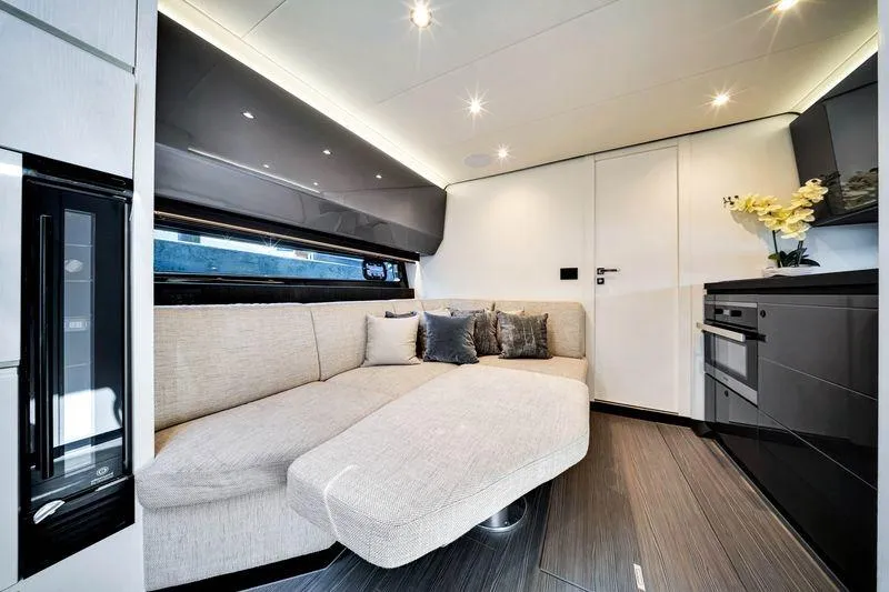Slide: The Image of Luxurious interior of 2023 Azimut Verve 47 yacht with modern sofa and sleek kitchen. - 32