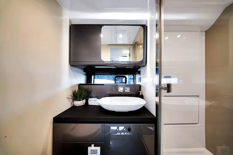Slide: The Image of Modern bathroom interior of 2023 Azimut Verve 47 yacht, featuring sleek design and elegant fixtures. - 35