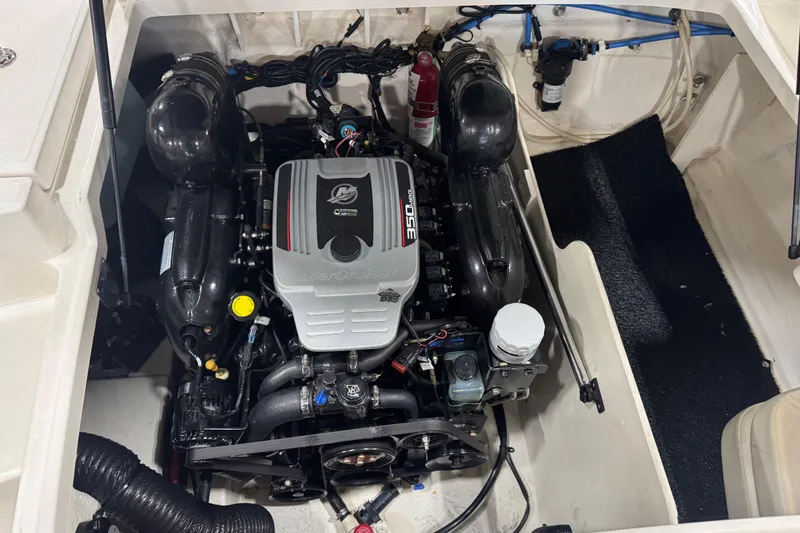 Slide: The Image of Engine compartment of a 2011 Sea Ray 240 Sundeck with MerCruiser 350 MAG engine. - 13