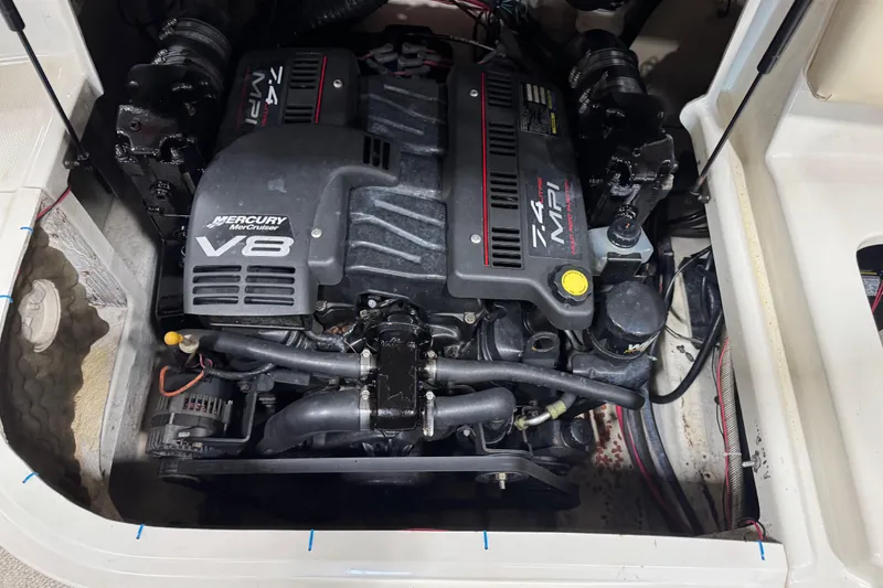 Slide: The Image of Engine compartment of a 2001 Sea Ray 240 Sundeck with Mercury V8 engine. - 18