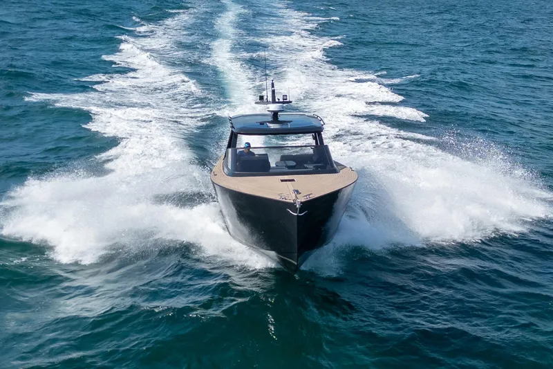 Slide: The Image of 2025 Colnago C38 OPEN yacht cruising on open sea, creating a dynamic water trail. - 16