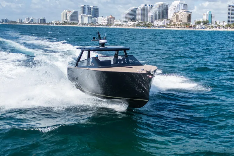 Slide: The Image of 2025 Colnago C38 OPEN yacht cruising near city skyline on a sunny day. - 18