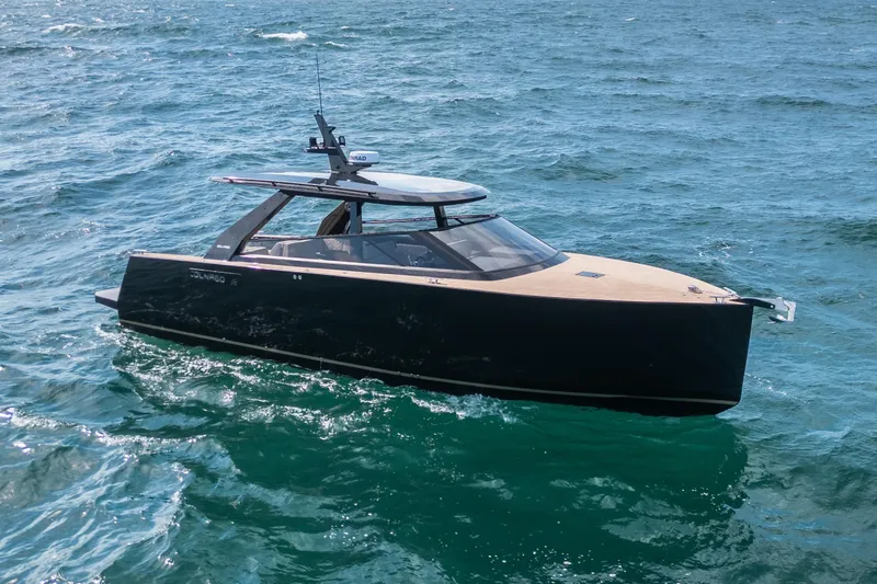 Slide: The Image of 2025 Colnago C38 OPEN yacht cruising on open water. - 2