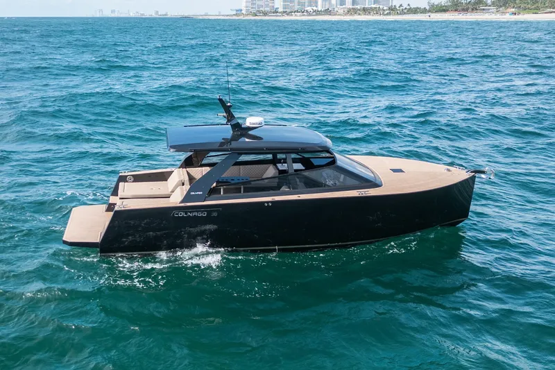 Slide: The Image of 2025 Colnago C38 OPEN yacht cruising on blue ocean waters. - 20