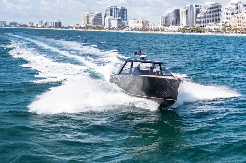 Slide: The Image of Luxury Colnago C38 OPEN yacht cruising near city skyline, 2025 model. - 23