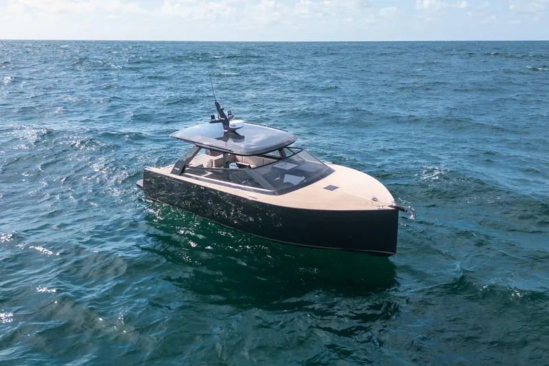 Slide: The Image of 2025 Colnago C38 OPEN yacht cruising on open sea under clear skies. - 3