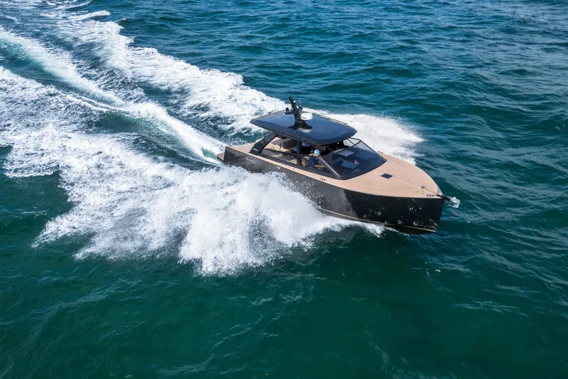 Slide: The Image of 2025 Colnago C38 OPEN yacht cruising on open water, creating dynamic waves. - 36