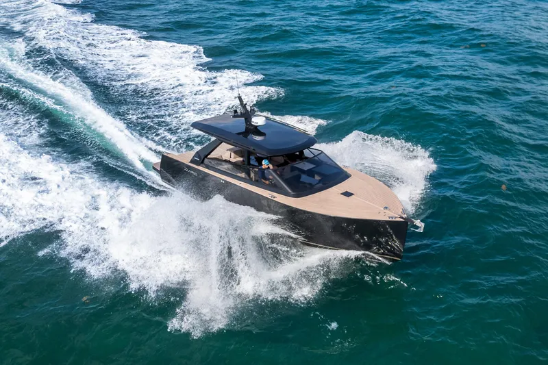 Slide: The Image of 2025 Colnago C38 OPEN yacht cruising on open water, creating dynamic waves. - 37