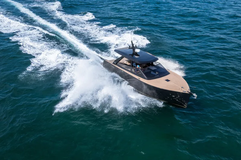 Slide: The Image of Luxury yacht Colnago C38 OPEN 2025 cruising swiftly on open sea waters. - 38