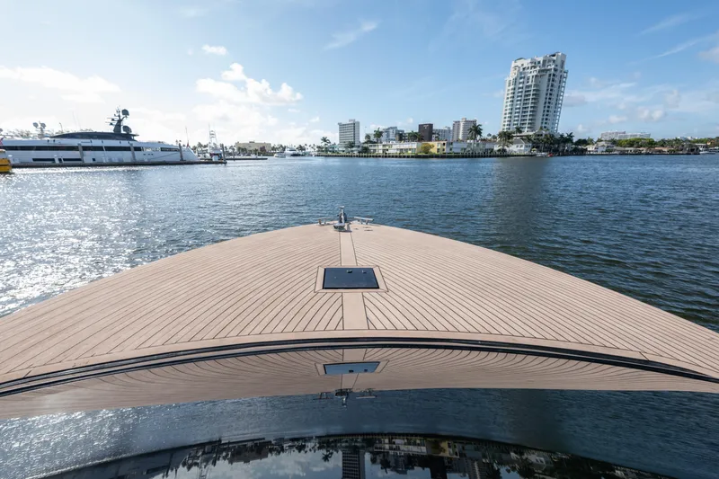 Slide: The Image of Bow view of 2025 Colnago C38 OPEN yacht on a sunny waterfront. - 54