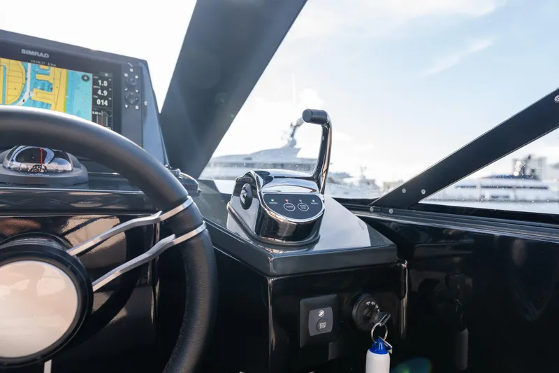 Slide: The Image of Cockpit of 2025 Colnago C38 OPEN boat with steering wheel and navigation display. - 59