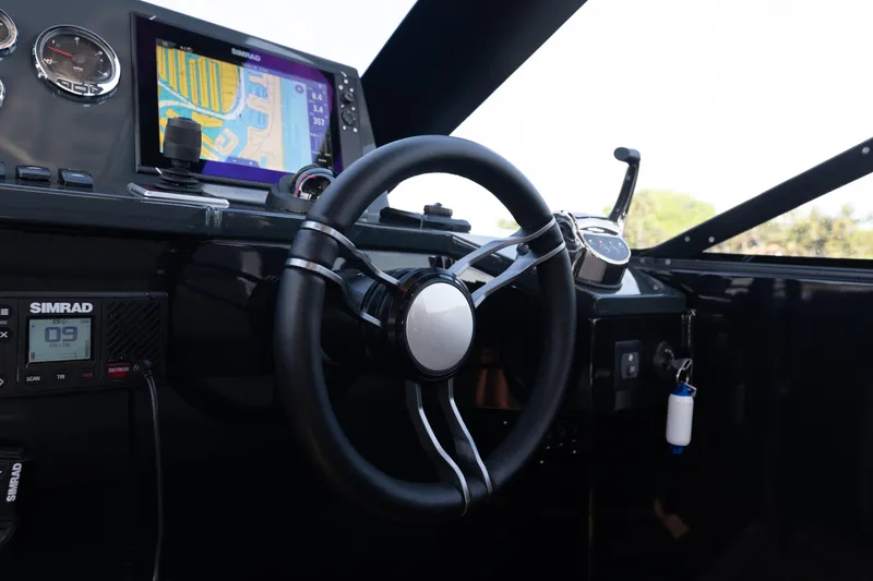 Slide: The Image of Steering wheel and navigation system of 2025 Colnago C38 OPEN boat. - 60