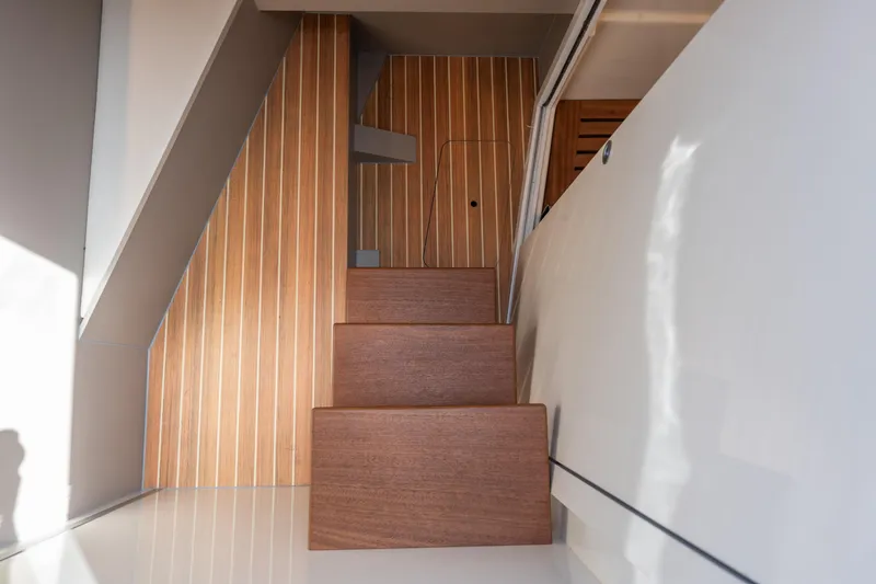 Slide: The Image of Modern wooden staircase inside 2025 Colnago C38 OPEN yacht. - 76