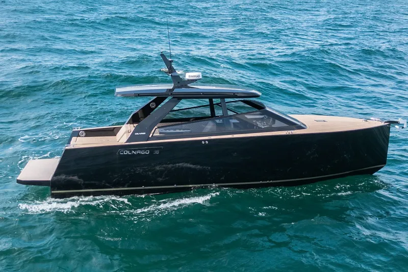 Slide: The Image of 2025 Colnago C38 OPEN yacht cruising on blue ocean waters. - 9