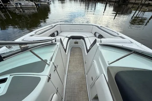 Slide: The Image of 2021 Crownline Eclipse E235 XS boat interior with spacious seating and sleek design. - 1