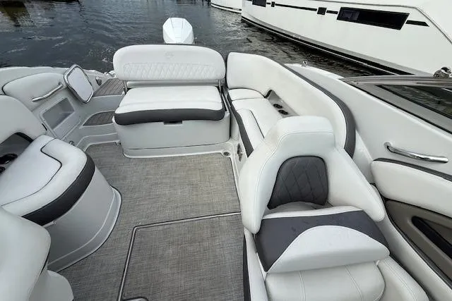 Slide: The Image of 2021 Crownline Eclipse E235 XS boat interior with luxurious seating and modern design. - 3
