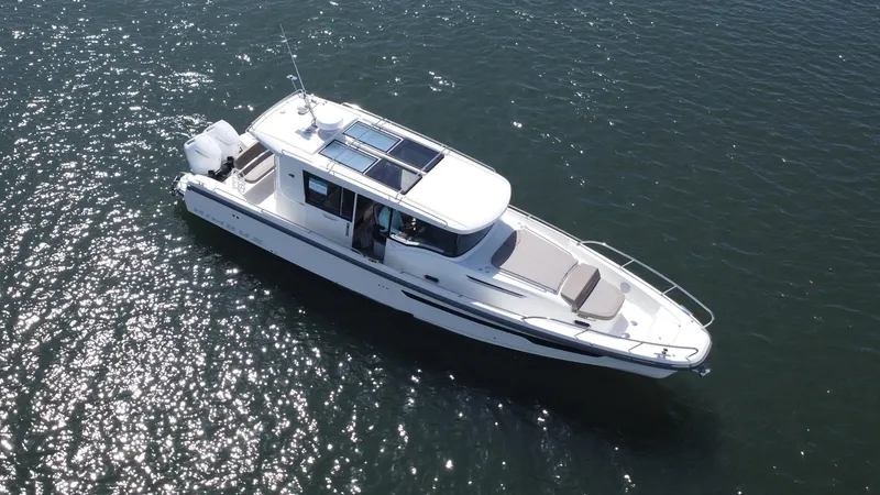 Slide: The Image of Aerial view of 2025 Nimbus Commuter 11 #086 boat on water. - 1