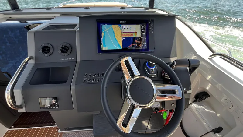 Slide: The Image of Steering console of 2025 Nimbus Commuter 11 #086 with navigation display. - 27
