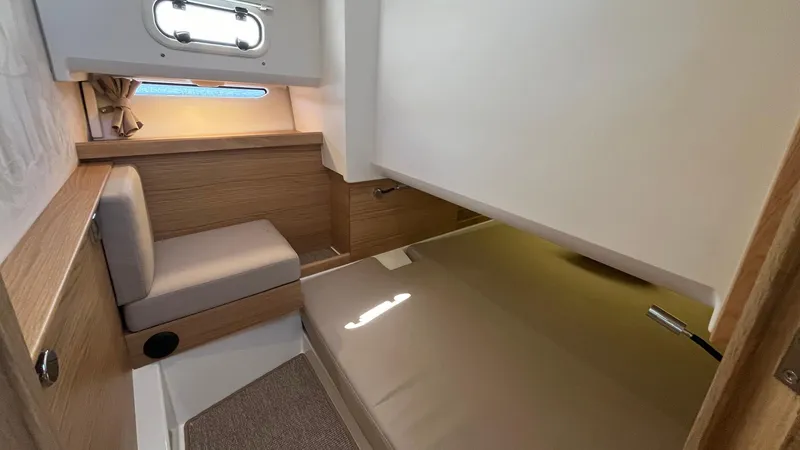 Slide: The Image of Cozy interior cabin of 2025 Nimbus Commuter 11, featuring modern design and comfortable seating. - 38