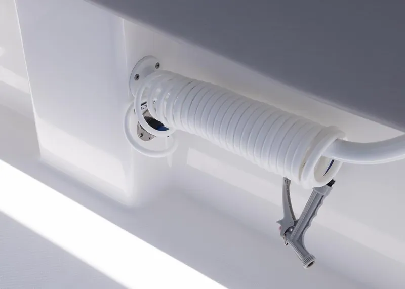 Slide: The Image of Coiled hose on 2025 Invincible 43 Open Fisherman boat. - 15