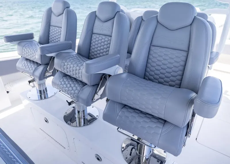 Slide: The Image of Luxurious seating on 2025 Invincible 43 Open Fisherman boat, featuring sleek, modern design. - 18