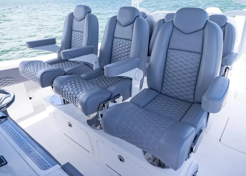Slide: The Image of Luxurious seating on 2025 Invincible 43 Open Fisherman boat, featuring sleek, modern design. - 21