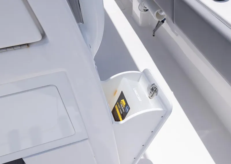 Slide: The Image of Storage compartment on 2025 Invincible 43 Open Fisherman boat deck. - 25