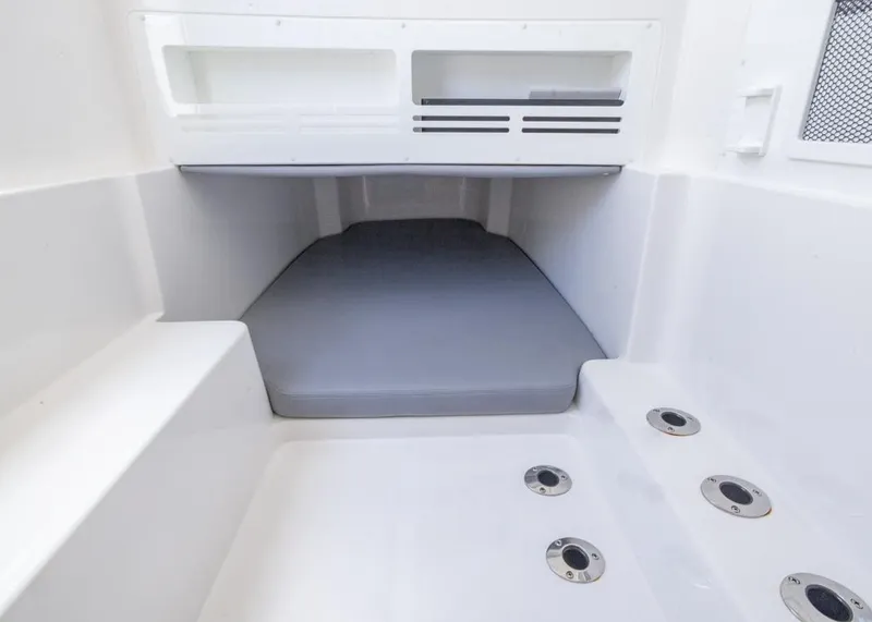 Slide: The Image of Interior view of 2025 Invincible 43 Open Fisherman boat cabin with seating area. - 38