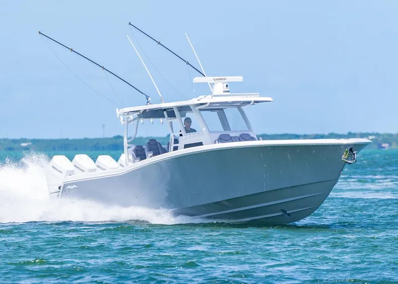 Slide: The Image of 2025 Invincible 43 Open Fisherman boat cruising on open water. - 47