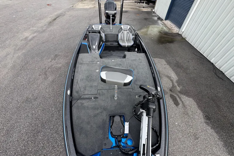 Slide: The Image of 2026 Skeeter ZXE20 fishing boat with spacious deck and modern seating. - 11