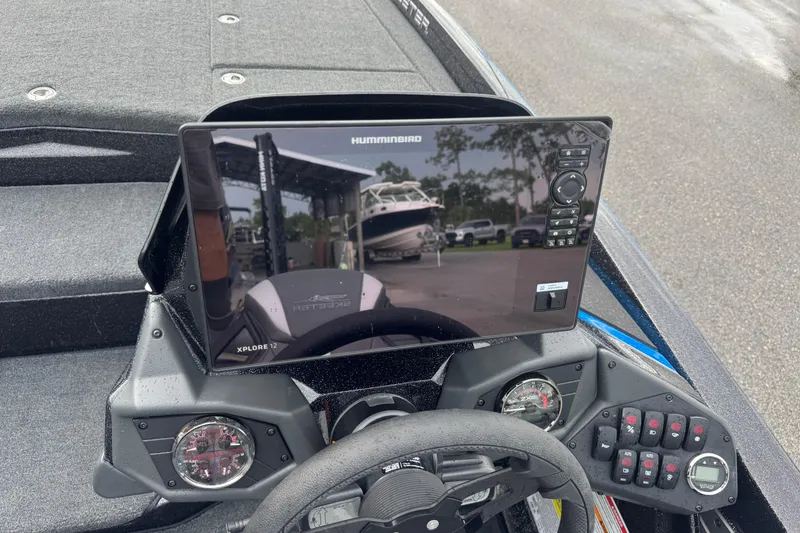 Slide: The Image of Dashboard of 2026 Skeeter ZXE20 boat with Humminbird Xplore 12 display. - 16