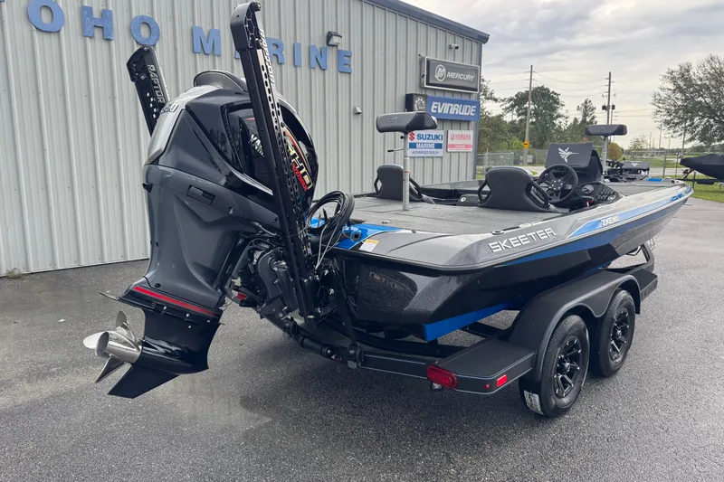 Slide: The Image of 2026 Skeeter ZXE20 boat with powerful outboard motor at Toho Marine dealership. - 22