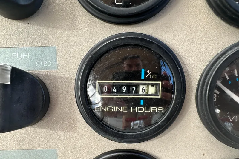 Slide: The Image of Close-up of 1997 Carver 325 Motor Yacht engine hours gauge showing 4976 hours. - 19