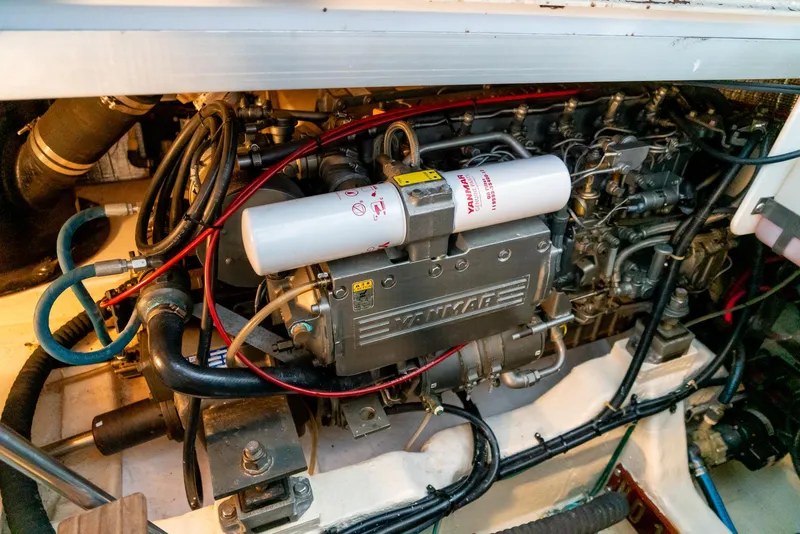 Slide: The Image of Engine compartment of a 2002 Legacy 34 Express boat. - 45