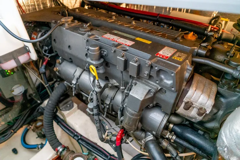 Slide: The Image of Engine compartment of a 2002 Legacy 34 Express boat. - 46
