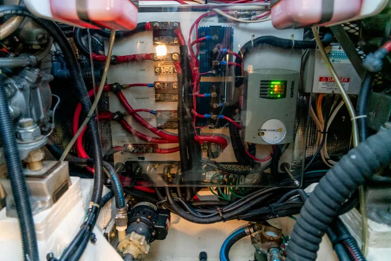 Slide: The Image of Electrical system and wiring inside a 2002 Legacy 34 Express boat. - 47
