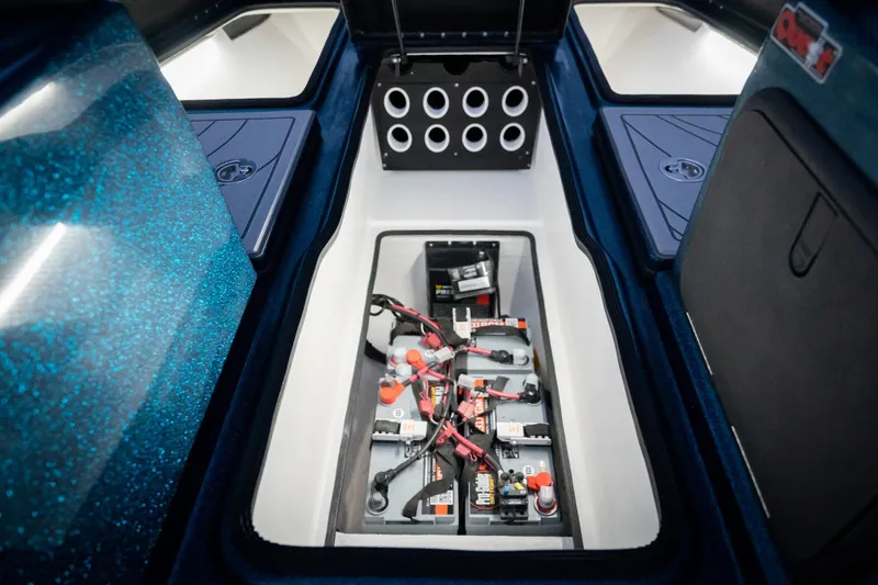 Slide: The Image of Battery compartment of 2025 Yar-Craft 210 TFX SP boat, showcasing advanced electrical setup. - 10
